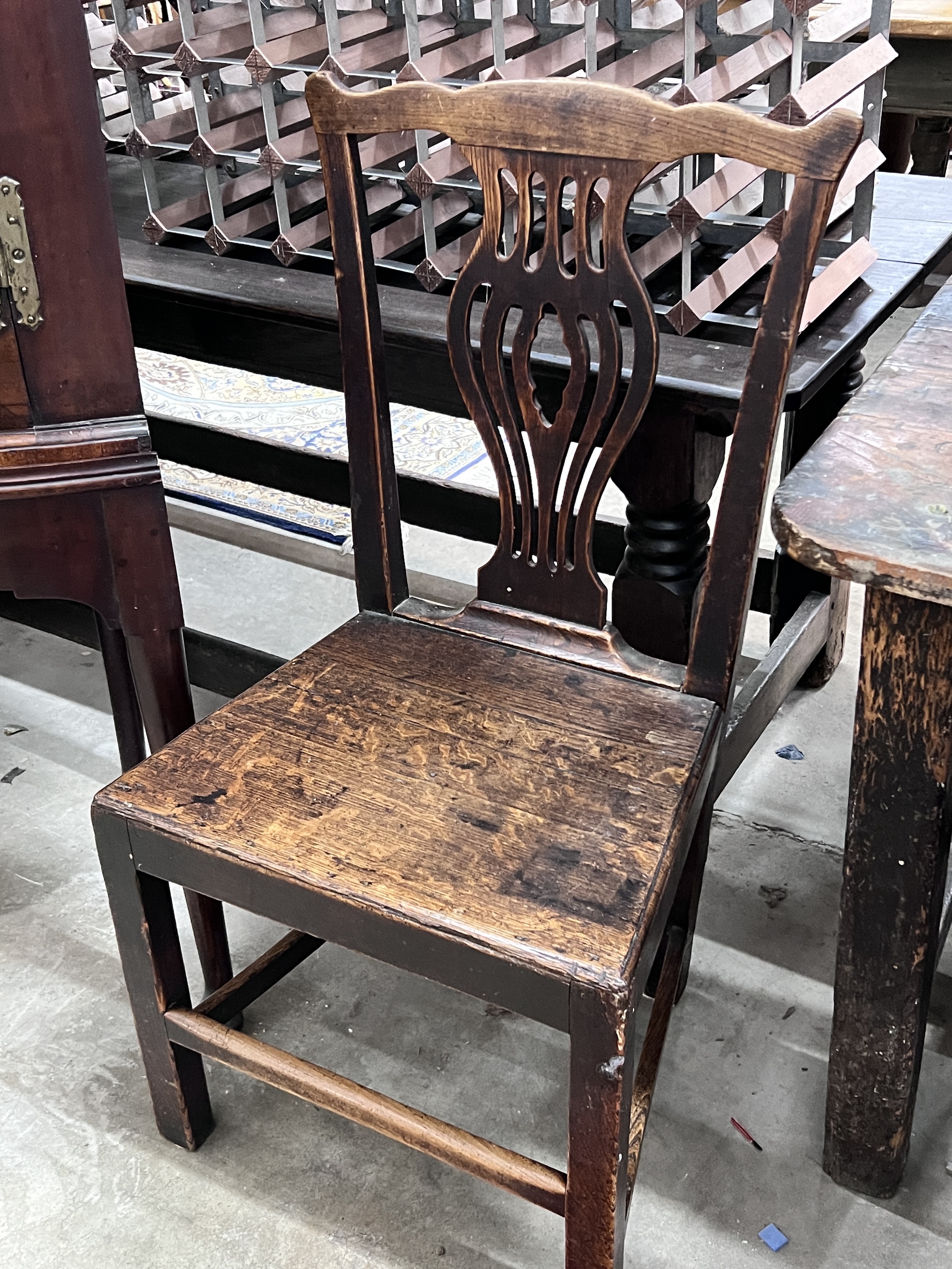 A set of four George III provincial fruitwood and oak wood seat dining chairs, width 49cm, depth 39cm, height 94cm